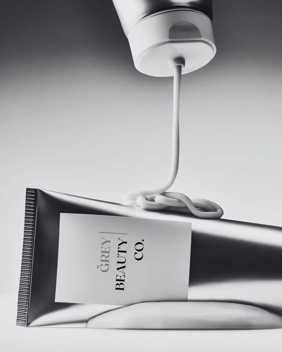 The Grey Beauty Co. branded tube, brand identity and packaging