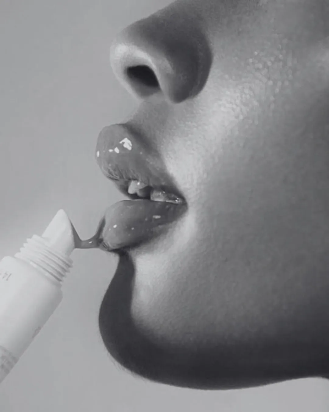 Close up of lips with gloss, makeup