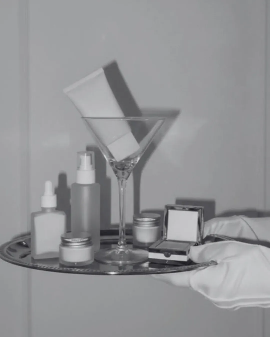 Beauty products presented on a tray, ready for launch